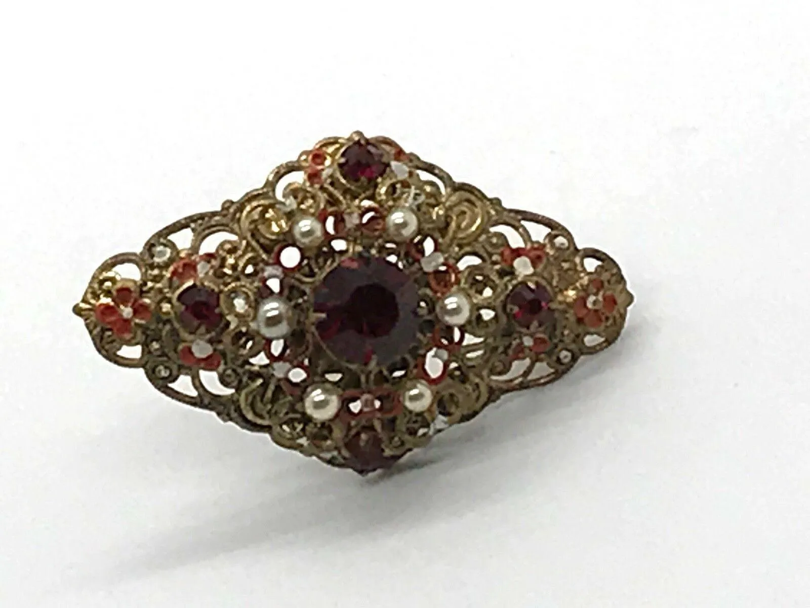 Exquisite Vintage Austrian Brooch with Filigree and Red Stones