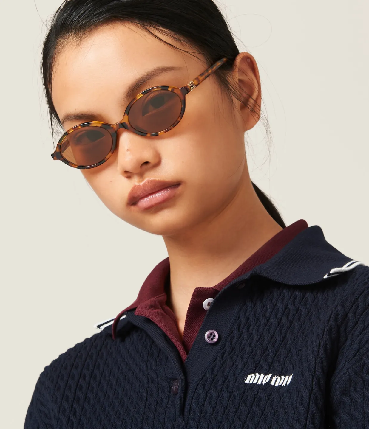 Miu Miu Oval Sunglasses in Light Havana