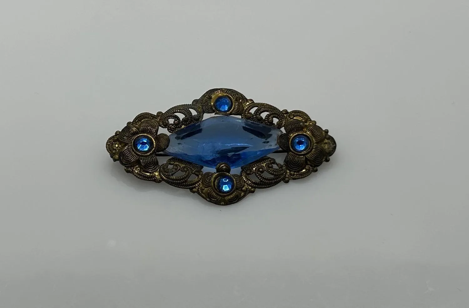 Vintage Filigree Victorian Brooch with Blue Stones