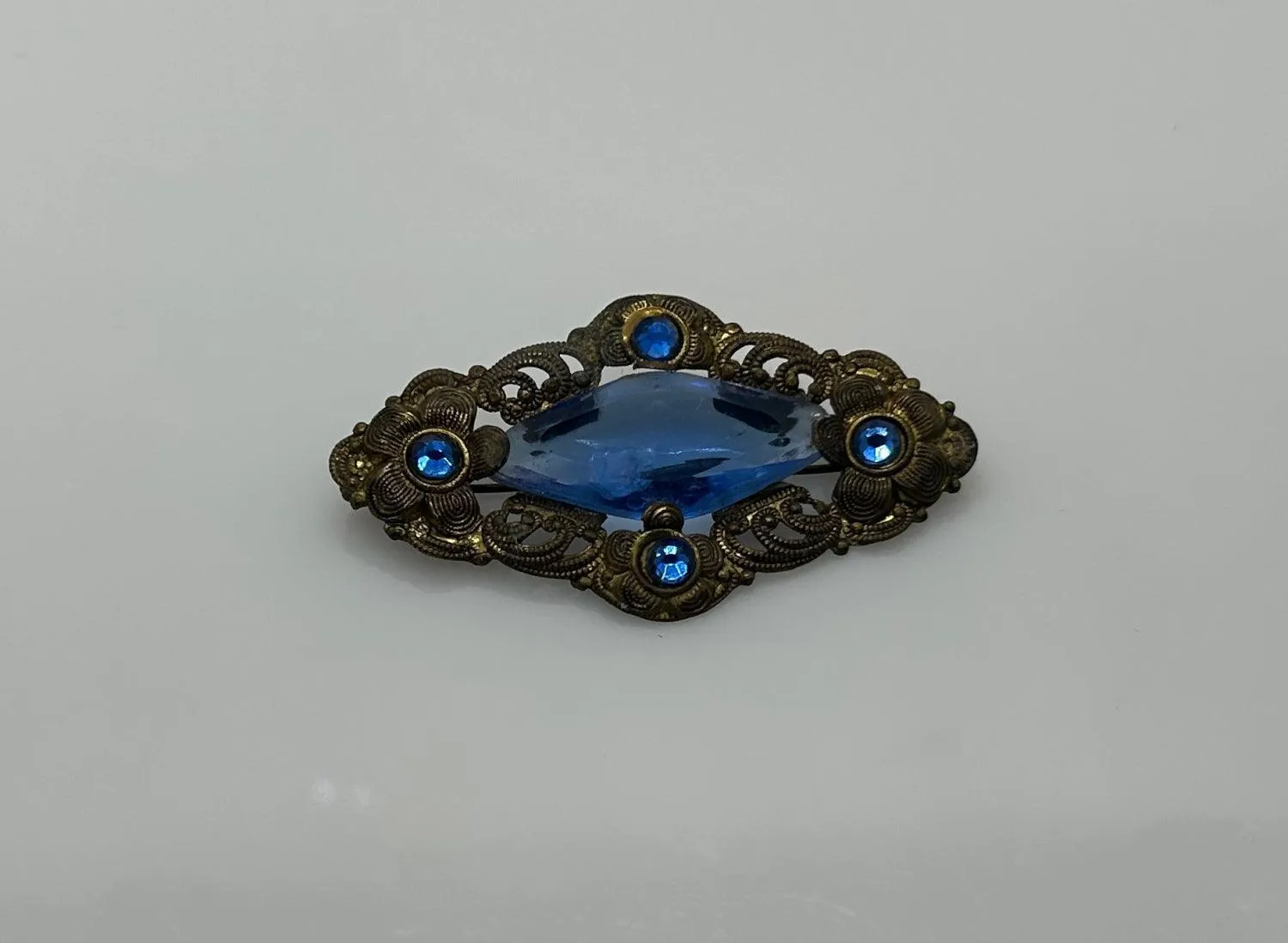 Vintage Filigree Victorian Brooch with Blue Stones